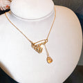 Gold Tone Oval Pearl Charm Necklaces With Decorative Accents view 7