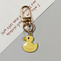 Yellow Duck Figure Gold Tone Clip Charms in Four Designs view 9