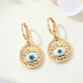 Gold Tone Ornate Evil Eye Medallion Huggie Earrings in Eight Designs view 6