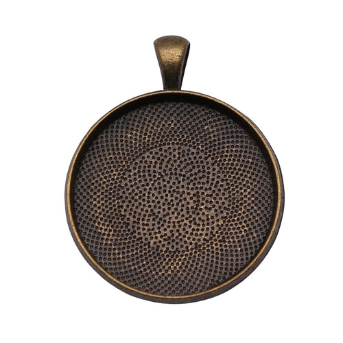 Antique Bronze Round Cabochon Pendant Tray with Mesh Texture shown in image 1 with a fine concentric mesh texture