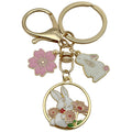 Cat Charm Keychains Featuring White Flower Across 19 Pictured Variations view 10