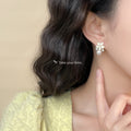 White Flower Pearl Drop Stud Earrings Clear Crystal Accents view 2