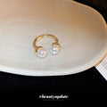 Textured Gold Tone Open Ring With Two Unequal Pearl Like Ends view 3