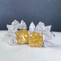 Yellow Cushion Center Clear Pear Accent Stud Earrings view 1