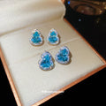 Blue Crystal Heart Stud Earrings In Two Metal Tones view 2