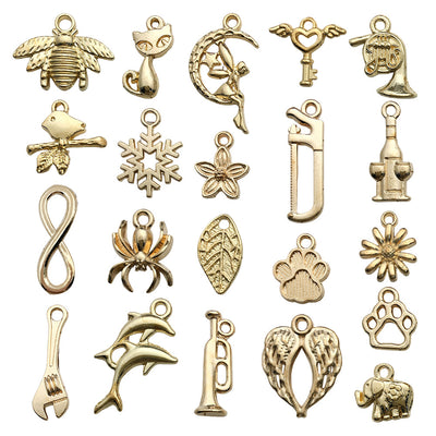 Yellow assorted shape charms arranged on a light background