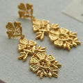 Gold Tone Textured Floral Statement Drop Stud Earrings view 1
