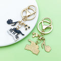 Piano and Music Note Charm Keychains Featuring Black Cat Across 33 Pictured Variations view 3