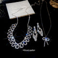 Silver Rhinestone Scallop Necklace Earring Set Bow Pendant view 2