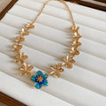 Gold Leaf Chain Enamel Flower Necklace and Bracelet view 6