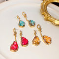 Gold Knot Asymmetric Druzy Drop Earrings Pink Amber view 1