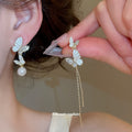 Asymmetric Butterfly Pearl And Chain Tassel Stud Earrings view 2