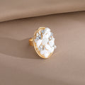 Gold Tone Oval Adjustable Rings with Irregular Chip Inlays view 2