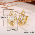 Gold Tone Floral Huggie Hoop Earrings With Clear Centers view 5