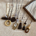 Black Cord Geometric Pendant Necklaces in Seven Designs view 2