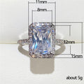 Rectangular Clear Solitaire Halo Ring In Polished Silver Tone view 5