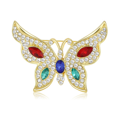 Front view of the multicolor crystal butterfly brooch in gold tone with polished metal detail on a white background