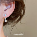 Square Stud Pearl Drop Earrings with Curved Silver Tone Stems view 3