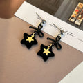 Black Fuzzy Bow and Star Outline Dangle Stud Earrings view 4