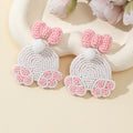 Pink Bow Stud White Seed Bead Rabbit Paw Drop Earrings view 1