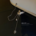 Silver Tone Pegasus And Four Point Star Chain Tassel Brooch view 4