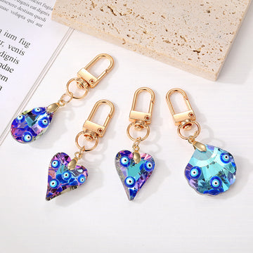 Gold Tone Blue Evil Eye Clip Keychains in Four Faceted Shapes