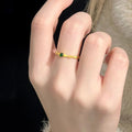 Slim Gold Tone Bamboo Segment Ring With Small Green Center Stone view 4