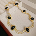 Gold Multi-Strand Oval Cabochon Necklace and Stud Earrings view 7