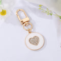 Gold Tone Crystal Heart and Star Medallion Clip Keychains view 7