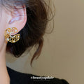 Openwork Crystal Swirl Stud Earrings With Polished Metal Tone Details view 3
