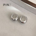 Polished Oval Huggie Hoop Earrings In Gold Silver And Three Sizes view 8