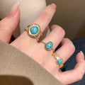 Gold Open Oval Turquoise Cabochon Twisted Band Ring view 4