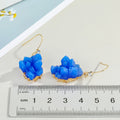 Gold Tone Hook Earrings with Irregular Blue and White Crystal Clusters view 2