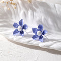 Pearl Centered Layered Metal Flower Stud Earrings in Five Colors view 7