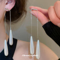 Silver Tone Pearl Teardrop Threader Earrings with Polished Metal Details view 1