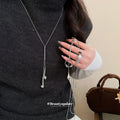 Silver Tone Lariat Necklace with Pearl and Crystal Rings view 1
