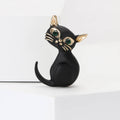 Black Enamel Sitting Cat Brooch with Green Crystal Eyes view 1