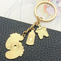 Eight Blue and Pink Baby Outfit Footprint Keychain Designs view 4