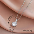 Prong-Set Round Clear Solitaire Necklace In Gold And Silver Tones view 5