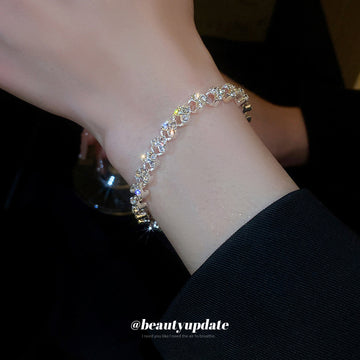 Silver Tone Interlocking Heart Crystal Link Bracelet