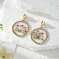 Irregular Gold Frame Dried Flower Resin Earrings Heart Posts view 8