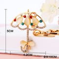 Mixed Lovebird Butterfly and Umbrella Keychains in Four Pictured Designs view 9
