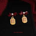 Red Enamel Bow Gold Wealth Charm Drop Earrings Pair view 3