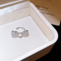 Silver Tone Crystal Bow Clip On Earrings In Three Shapes view 8
