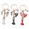 White Black and Red Dress Mannequin Metal Keychain Set view 5