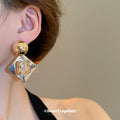 Gold and Silver Tone Geometric Drop Earrings With Amber Crystals view 4