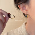 Gold Half Hoop Stud Earrings Black Enamel Red Daisy Flowers view 3