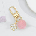 Wool Felt Ball Keychain With White Enamel Flower Charm And Gold-Tone Clasp view 9
