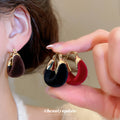 Gold Tone Hoop Earrings With Red and Black Velvet With Polished Metal Details view 2