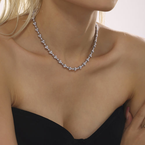 Steel shell pearl clover necklace worn as choker on model